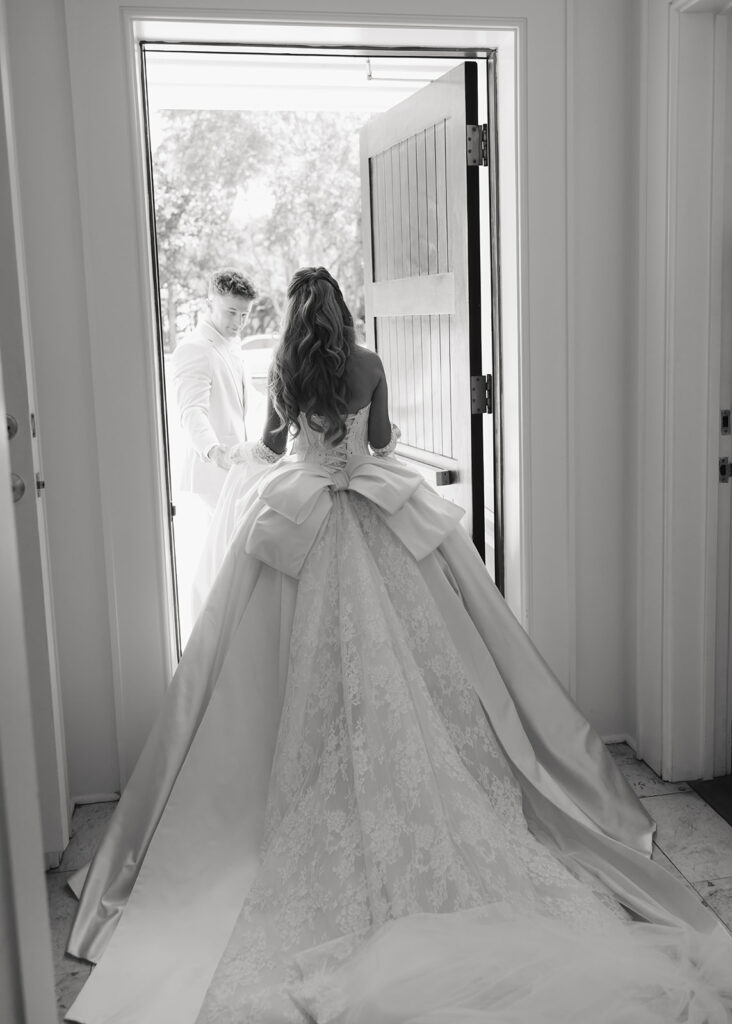 bride and groom walk out of the chapel in 30A Florida