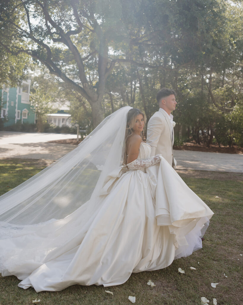 bride and groom walk in Rosemary Beach
