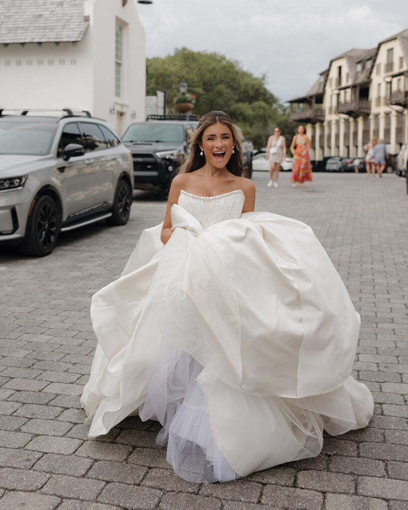 bride walks the streets of Rosemary beach