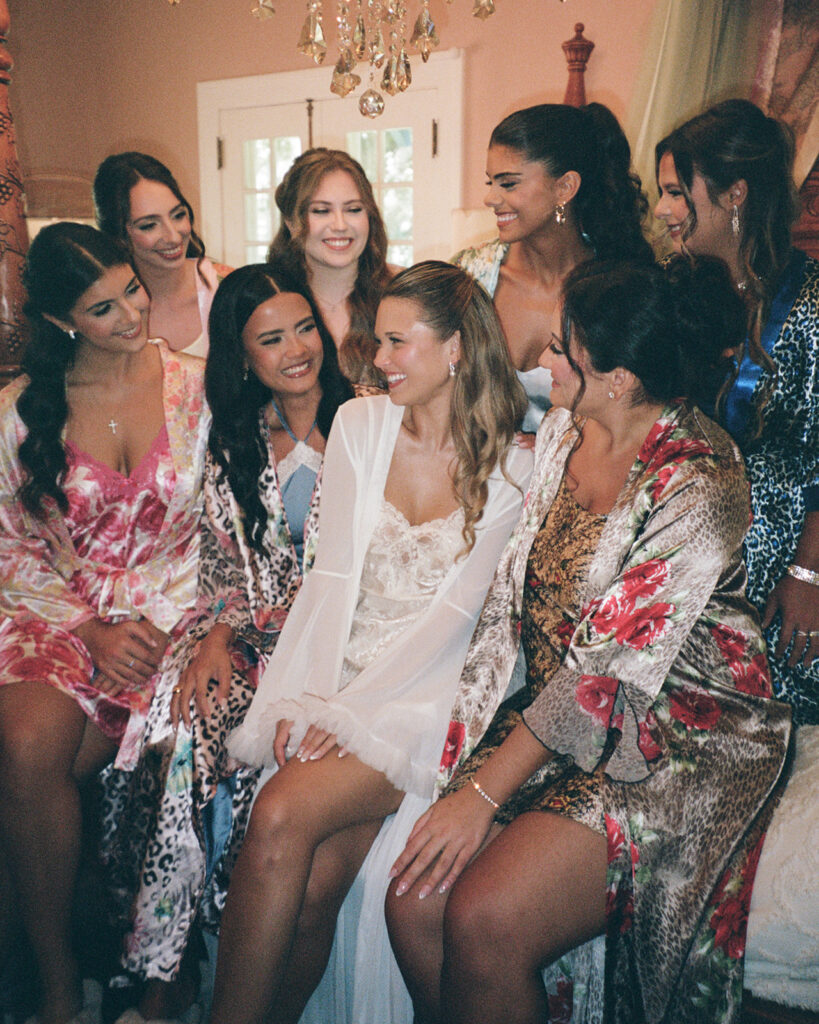 bride and bridesmaids laugh at Sydonie Mansion