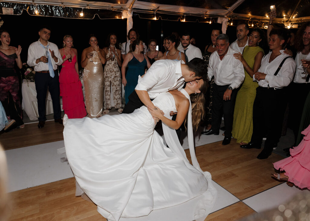 bride and groom dip kiss at Sydonie Mansion
