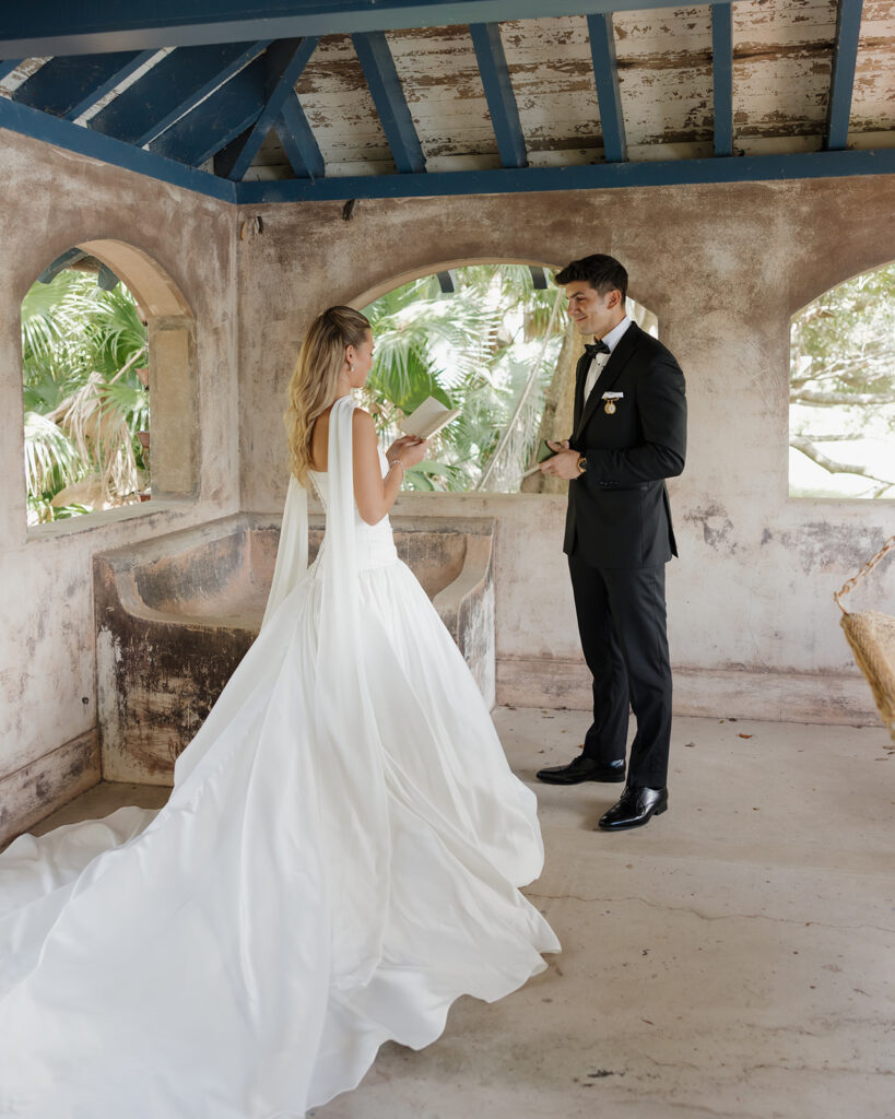 bride and groom exchange vows