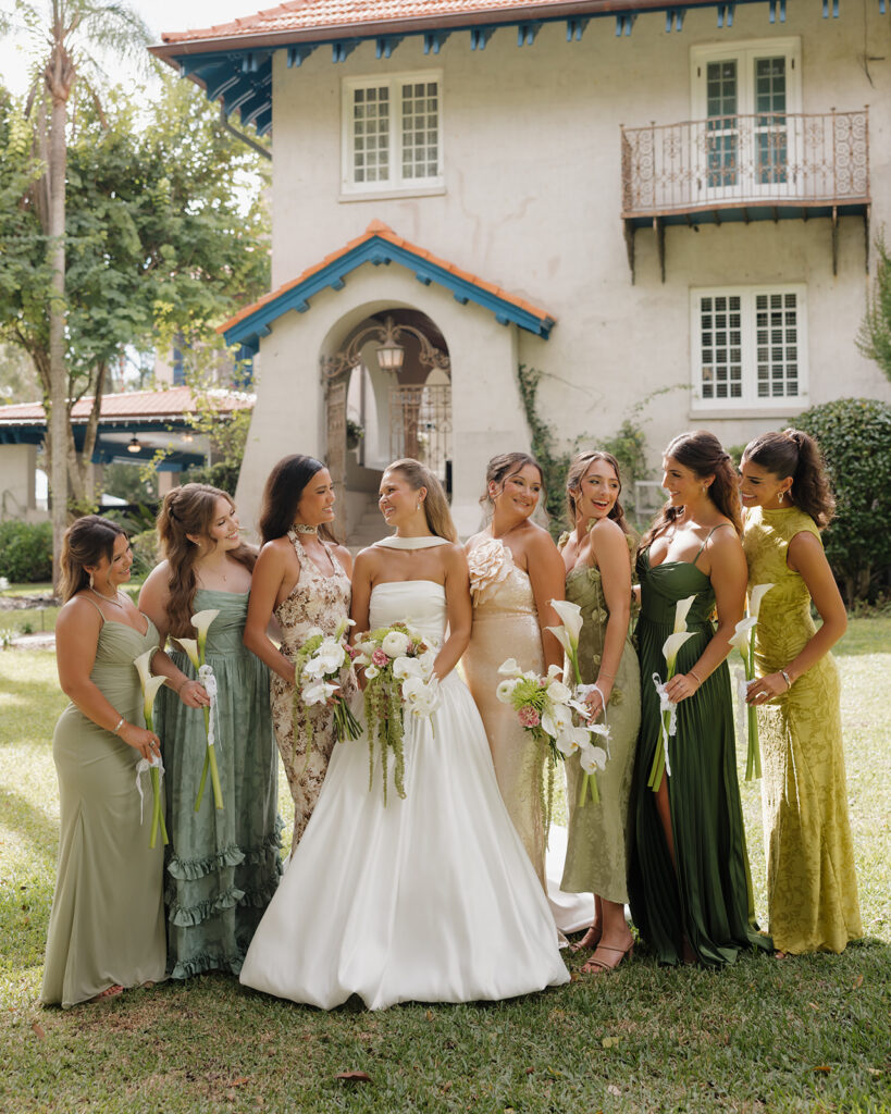 bride and bridesmaids smile