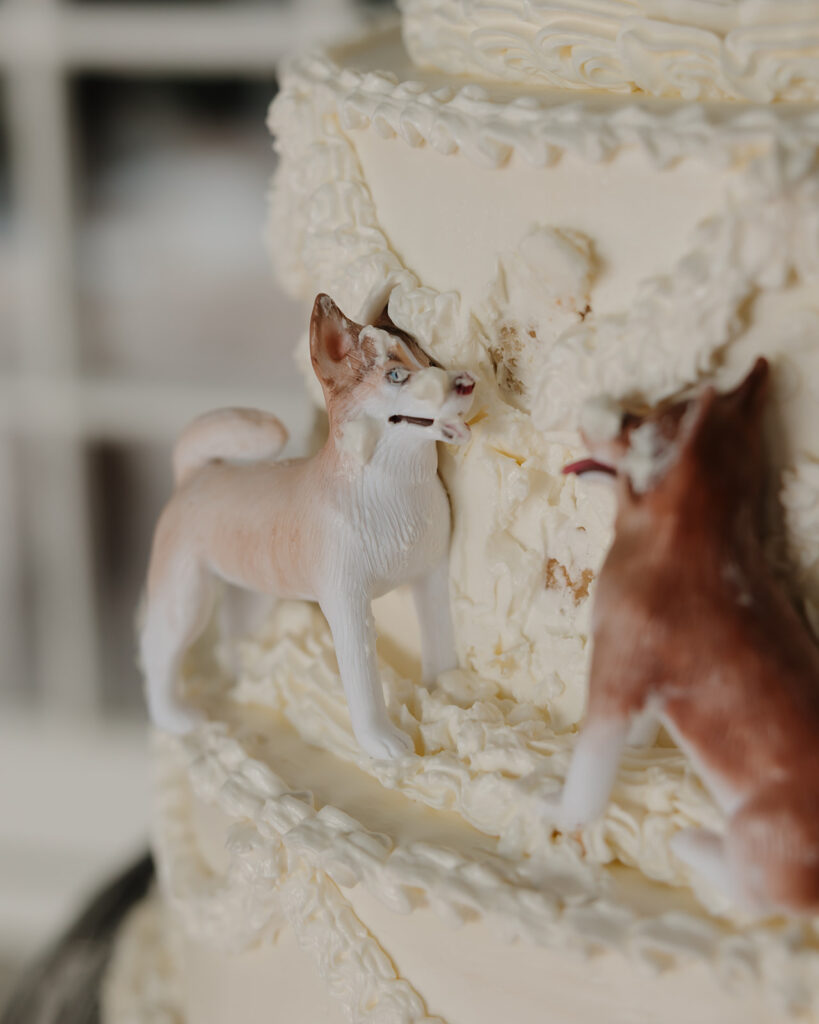 wedding cake with a dog topper