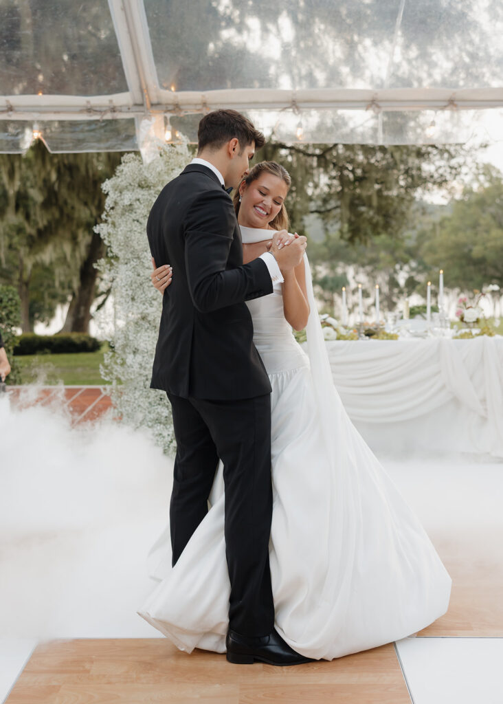 bride and groom share first dance